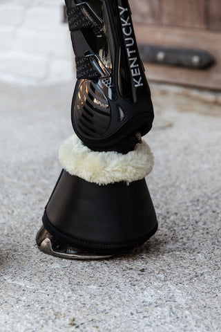 Boots van kunstleer met kunstlamsvacht Zwart/Crème